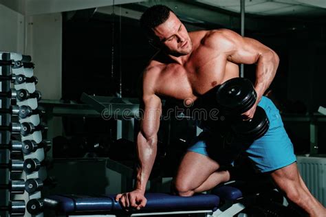 Guy In Gym Sport Man Concept Sporty Male With Naked Torso Workout Exercises With Dumbbells