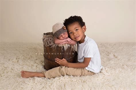 Newborn with a sibling portrait session