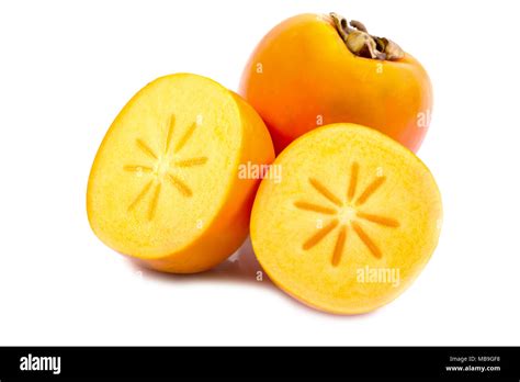 Persimmon Fruit Cut In Half Hi Res Stock Photography And Images Alamy