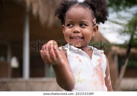 Happy African American Kid Girl Holding Stock Photo 2215515389