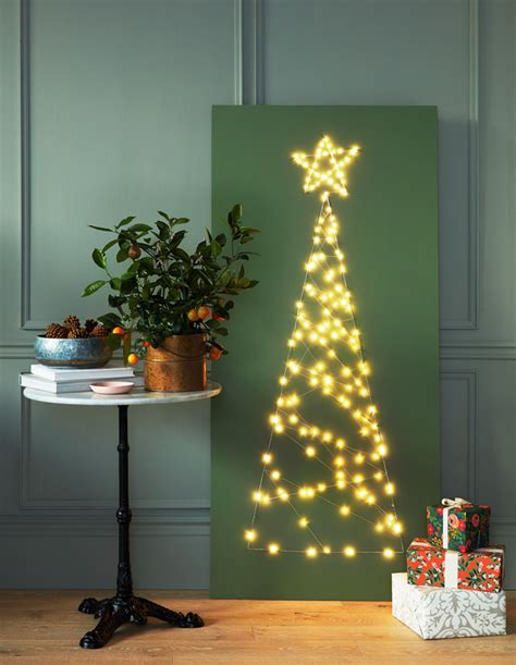 House And Home 20 Petite Christmas Trees Perfect For Small Spaces