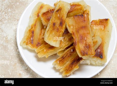 Grilled Yucca Root From Overhead Stock Photo Alamy