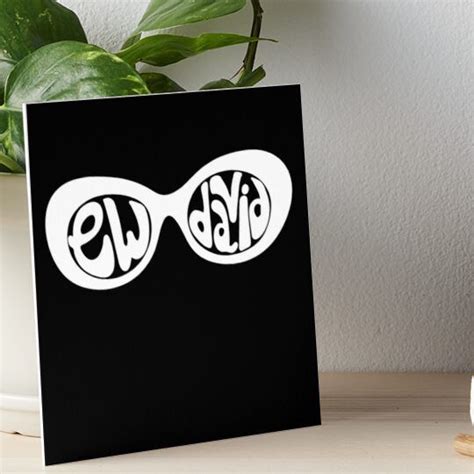 an image of two sunglasses with the word w on them art board print by ...