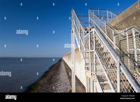 Steps Over The Sea Wall On Canvey Island Essex England Stock Photo