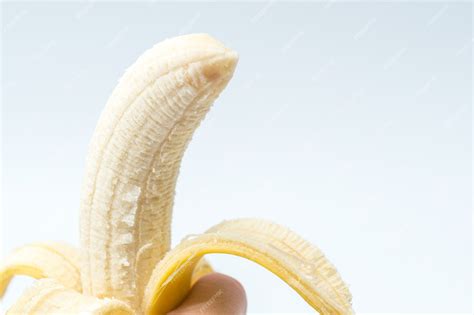 Premium Photo Human Hand Holding Banana Fruit Nutrition Concept