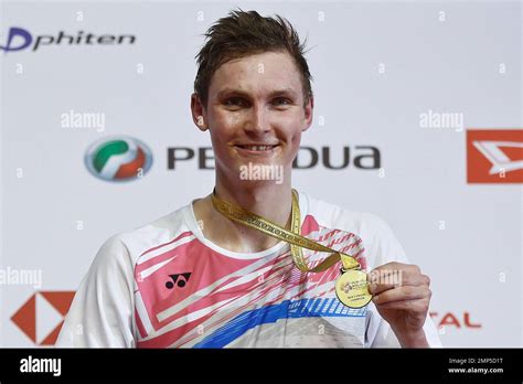 Viktor Axelsen Of Denmark Poses With His Gold Medal After Winning His