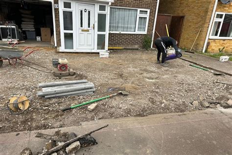 Charcoal Block Paved Driveway With Double And Single Natural Grey