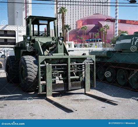 A Military Fork Lift In An Outdoor Warehouse Editorial Stock Photo