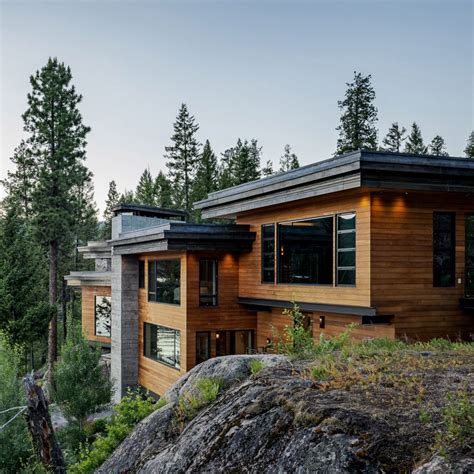 Cliff House in Idaho steps down a granite slope to a lake | Dezeen ...