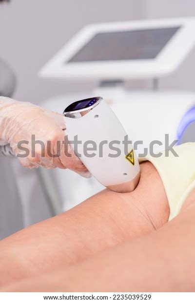 Professional Beautician Removes Hair On Female Stock Photo 2235039529 ...