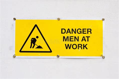 Danger men at work stock image. Image of notice, united - 19316563
