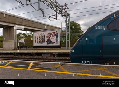 See How They Run Billboard With Train Approaching At Milton Keynes