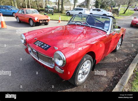 Mg Sportscars An Mg Midget With An Mgb In The Background At The
