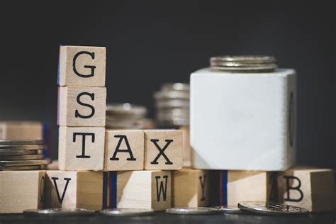 Premium Photo Close Up Of Gst Text On Wooden Blocks