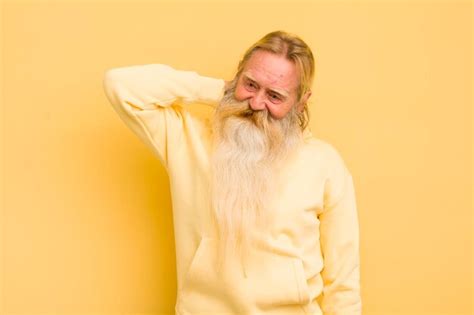 Premium Photo Senior Cool Bearded Man Laughing Cheerfully And