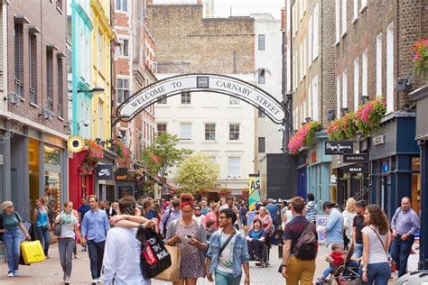 Carnaby street, shopping street with people in London – Stock Editorial ...