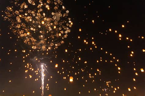 Thai People Release Sky Floating Lanterns Or Lamp To Worship Buddhas