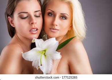 Two Beautiful Lesbian Women Erotic Foreplay Stock Photo