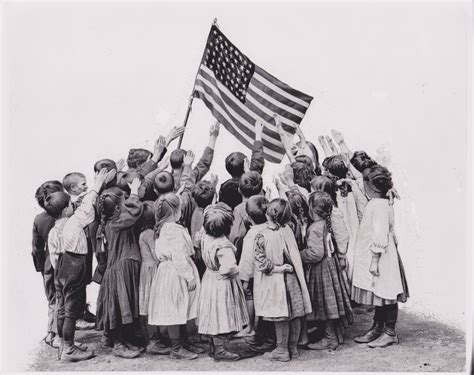 Early Photograph of children saluting “Bellamy style” Date: 1900 circa ...