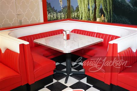 Vintage Style Corner Diner Booth With Chrome Table And Accessories