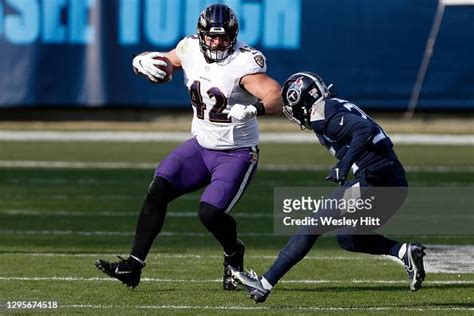 Fullback Patrick Ricard of the Baltimore Ravens carries the ball for ...