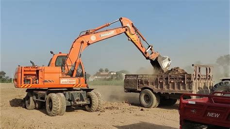 The Ultimate Guide To Using Excavators For Mud Loading Youtube