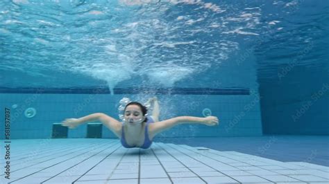 Beautiful Girl Teenager Swimming In Pool Under Water In Bikini Pretty Female Person Diving In