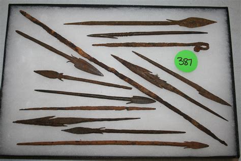 Lot Frame With 13 Metal Fish Spears