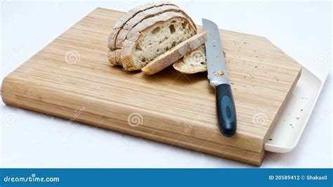 Bread And Knife On A Cutting Board Stock Photo Image Of Breakfast