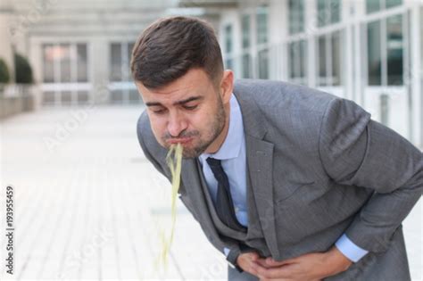 Sick Businessman Throwing Up In The Office Stock Photo And Royalty