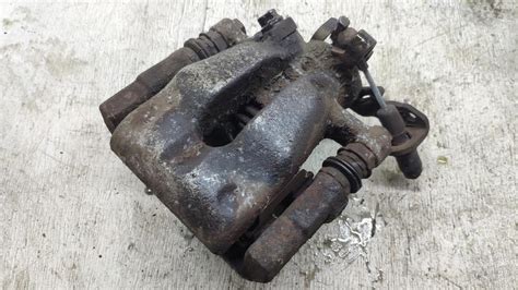 Суппорт задній лівий Опель Астра H, Opel Astra H 2004-2015 931 ...