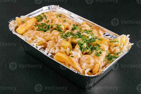 delicious french fries with cheese sauce 30516985 Stock Photo at Vecteezy