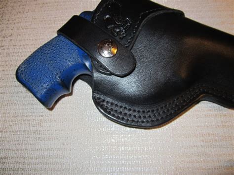 ITEM # 856 - Taurus 85 38 special and taurus small frame 2" to 2 1/2"barrel revolver holster