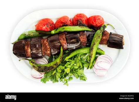 Eggplant Kebab In Turkish Patlican Kebap On A White Background And