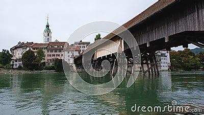 View on the Small Town of Olten, River Aare and Old Wooden Bridge and St. Martin S Church is the ...