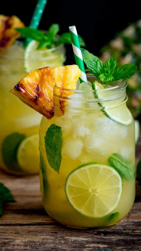 Pineapple Ginger Mojitos With Spiced Rum Fun Drink Recipe Spiced Rum Drinks Alcohol Recipes