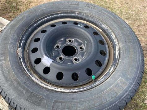 4 - Michelin Tires w/ rims, 225/65R17 - Wild Rose Auction Services