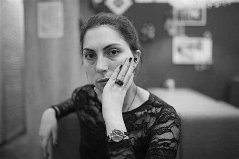 Premium Photo Portrait Of Woman With Hand On Chin At Home