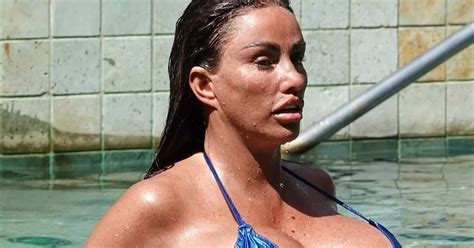 Katie Price Struggles To Contain Biggest Ever Boob Job In Blue Micro