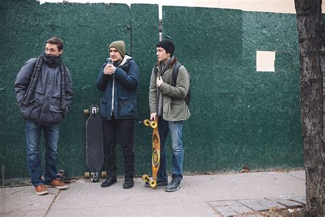 "Young Men Friends Hanging Out In Brooklyn On A Weekend" by Stocksy Contributor "Joselito ...