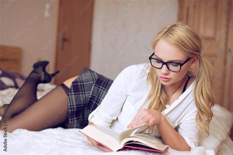 Sexy Clever Woman Reading Book On Bed Foto De Stock Adobe Stock