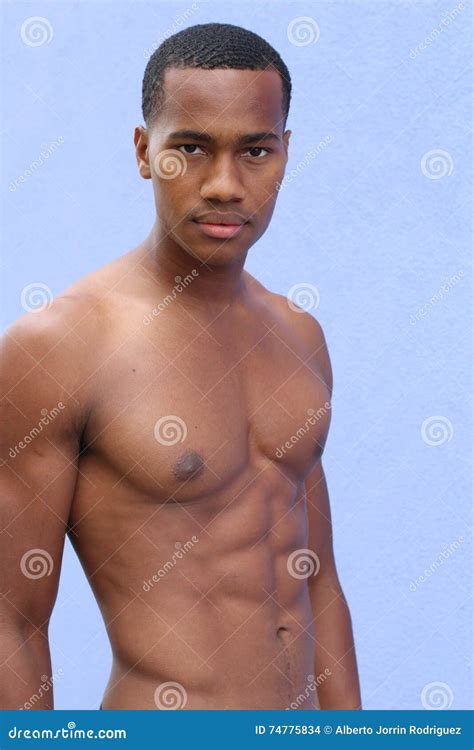 Portrait Of A Lean Toned And Ripped Muscle Fitness Man Under Soft