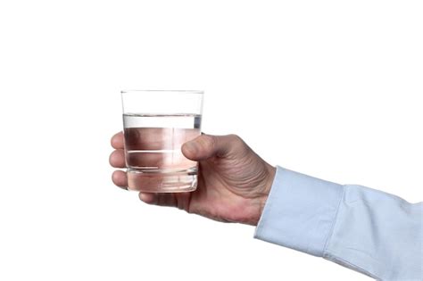 Premium Photo Midsection Of Man Drinking Glass Against White Background