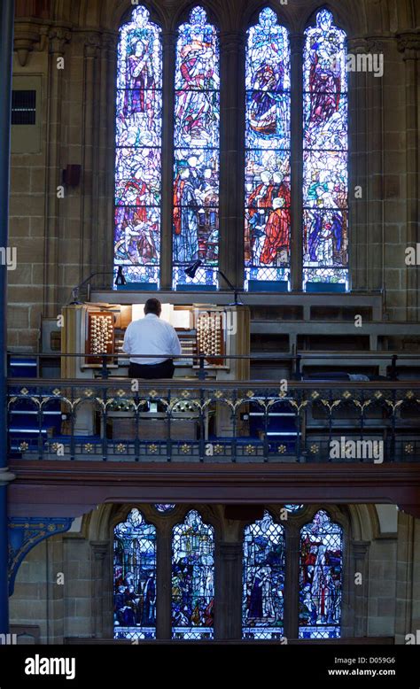 Organist playing an organ in church Stock Photo - Alamy