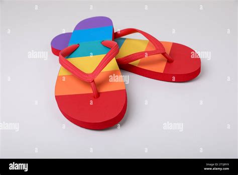 Stylish Rainbow Flip Flops On White Background Stock Photo Alamy