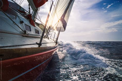 Sailing Yacht Sails On The Sea Sailboat Speeding Through Stormy Rough