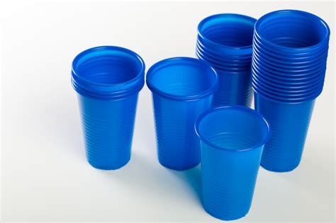 Premium Photo Blue Disposable Plastic Glasses