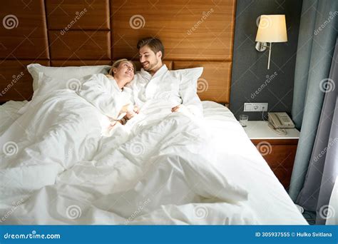 Blonde Woman And Her Boyfriend Are Relaxing In Cozy Hotel Room Stock Image Image Of Honeymoon