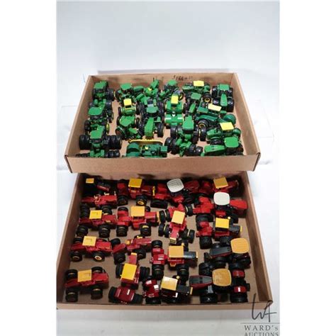 Selection of 1/64 scale diecast historical 4WD tractors including John Deere and Versatile ...