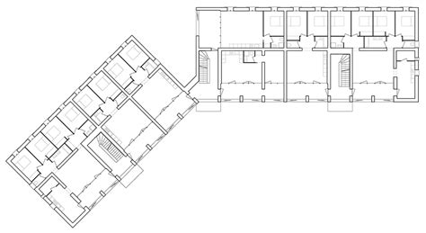 Social Housing With Solid Stone Walls By Perraudin Architecture